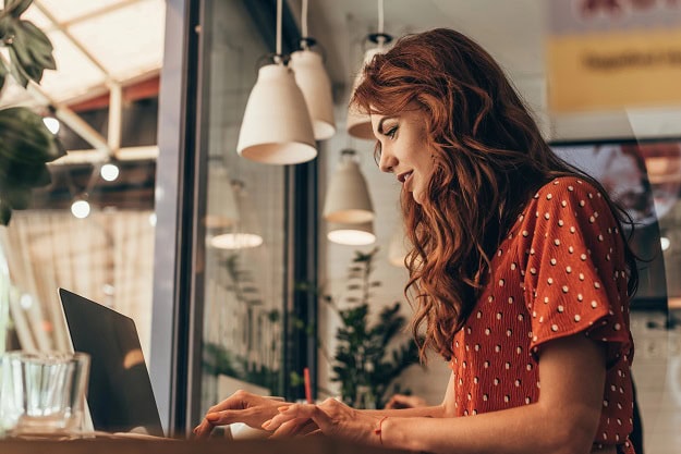 Woman using her laptop.